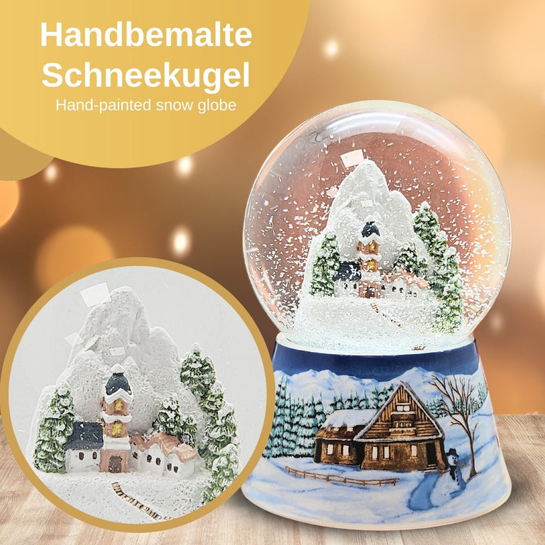 Nostalgische Schneekugel Bergdorf auf Sockel Winterlandschaft mittelblau 100 mm Durchmesser mit Spieluhr - Schneekugelhaus