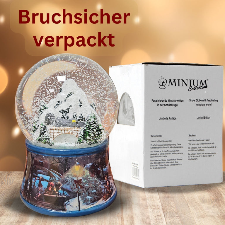 Nostalgische Schneekugel Berglandschaft Brücke Sockel Eisläufer 100 mm Durchmesser mit Spieluhr - Schneekugelhaus